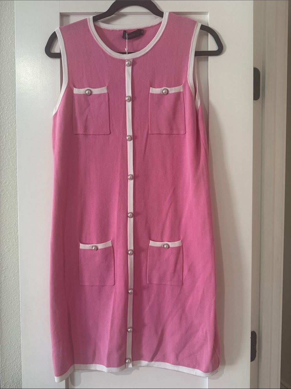 Sleeveless Pink Shift Dress with White Trim and Button Front